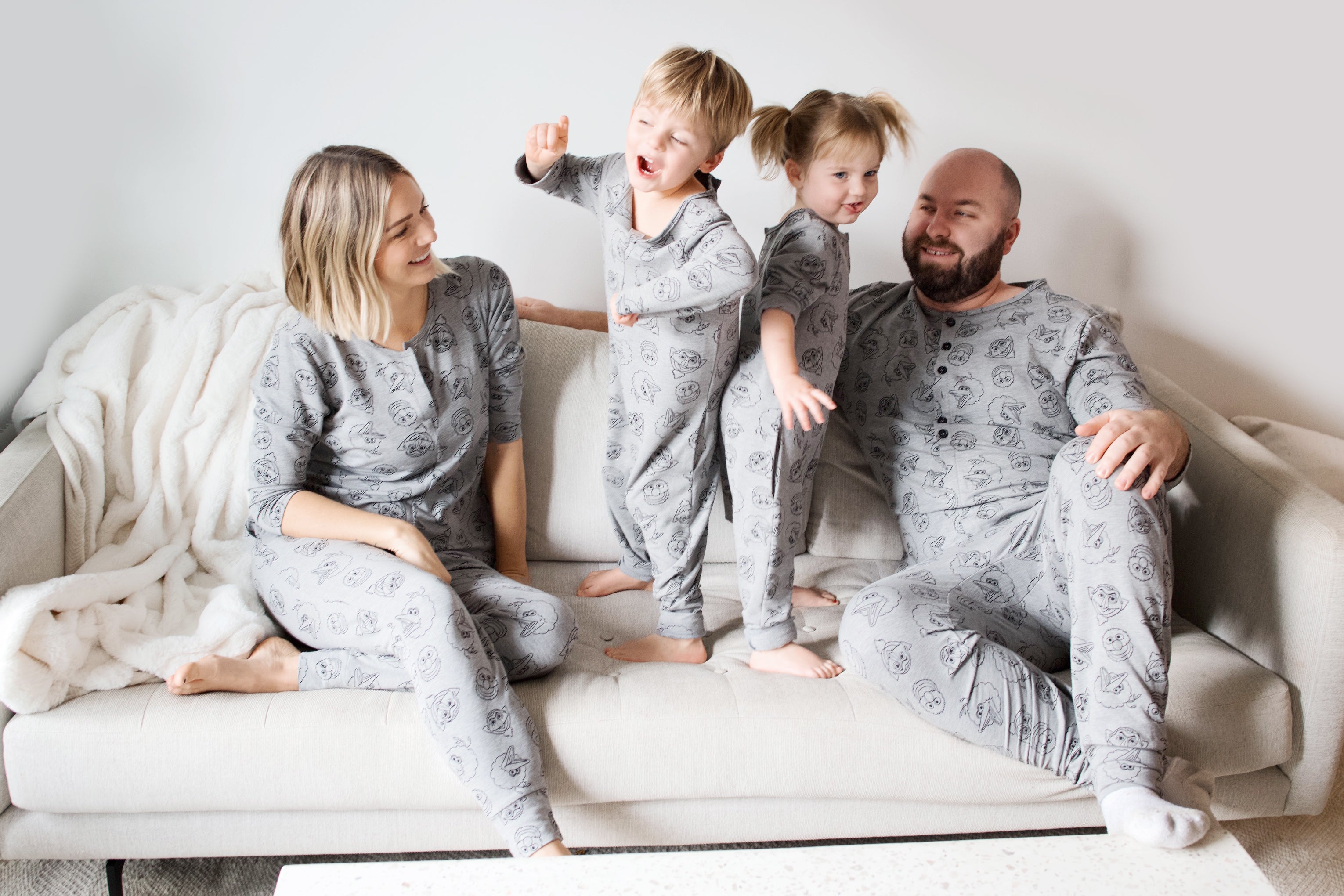 adrienne neufeld and family in smash + tess sesame street rompers