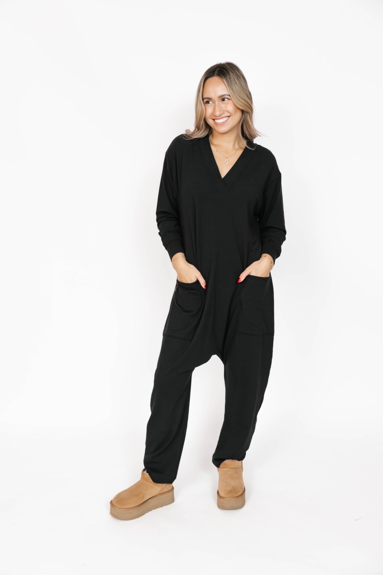 Abigael Long Sleeve Romper in Midnight Black